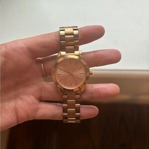 Rose gold Michael kors watch. Never worn. Brand new
